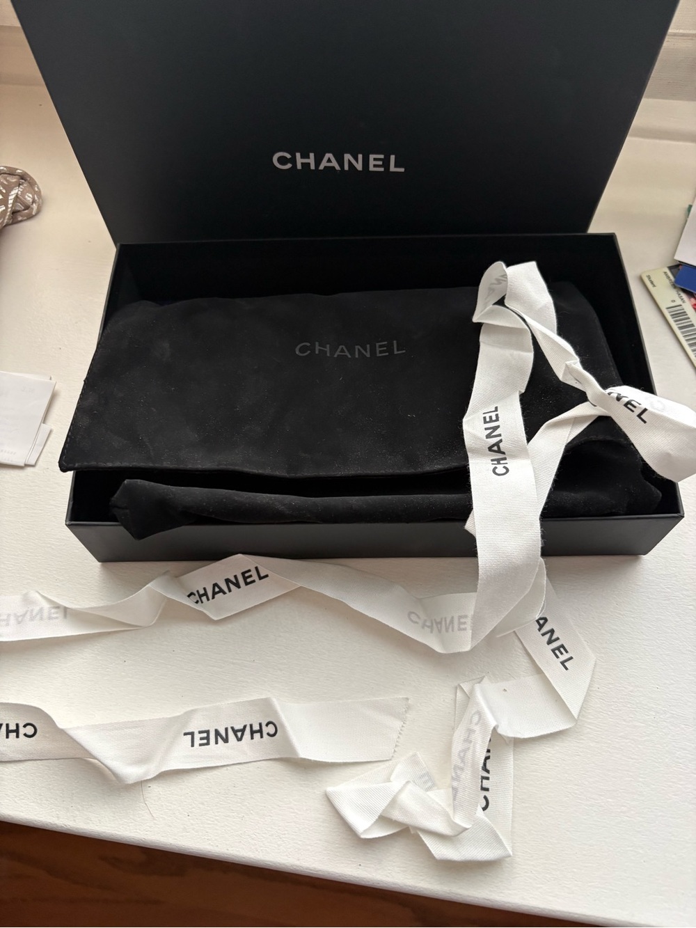 CHANEL Black Quilted Zip Wallet with Gold CC Logo